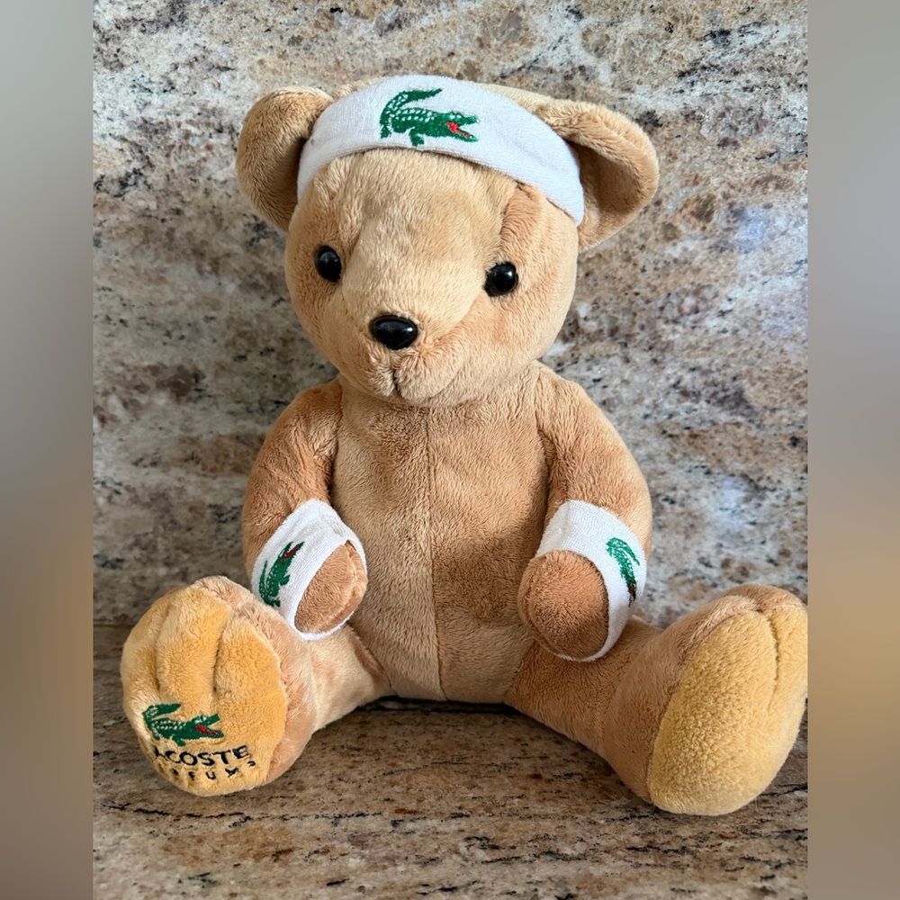 Lacoste beige Perfume Teddy Bear with Lacoste Gator logos.